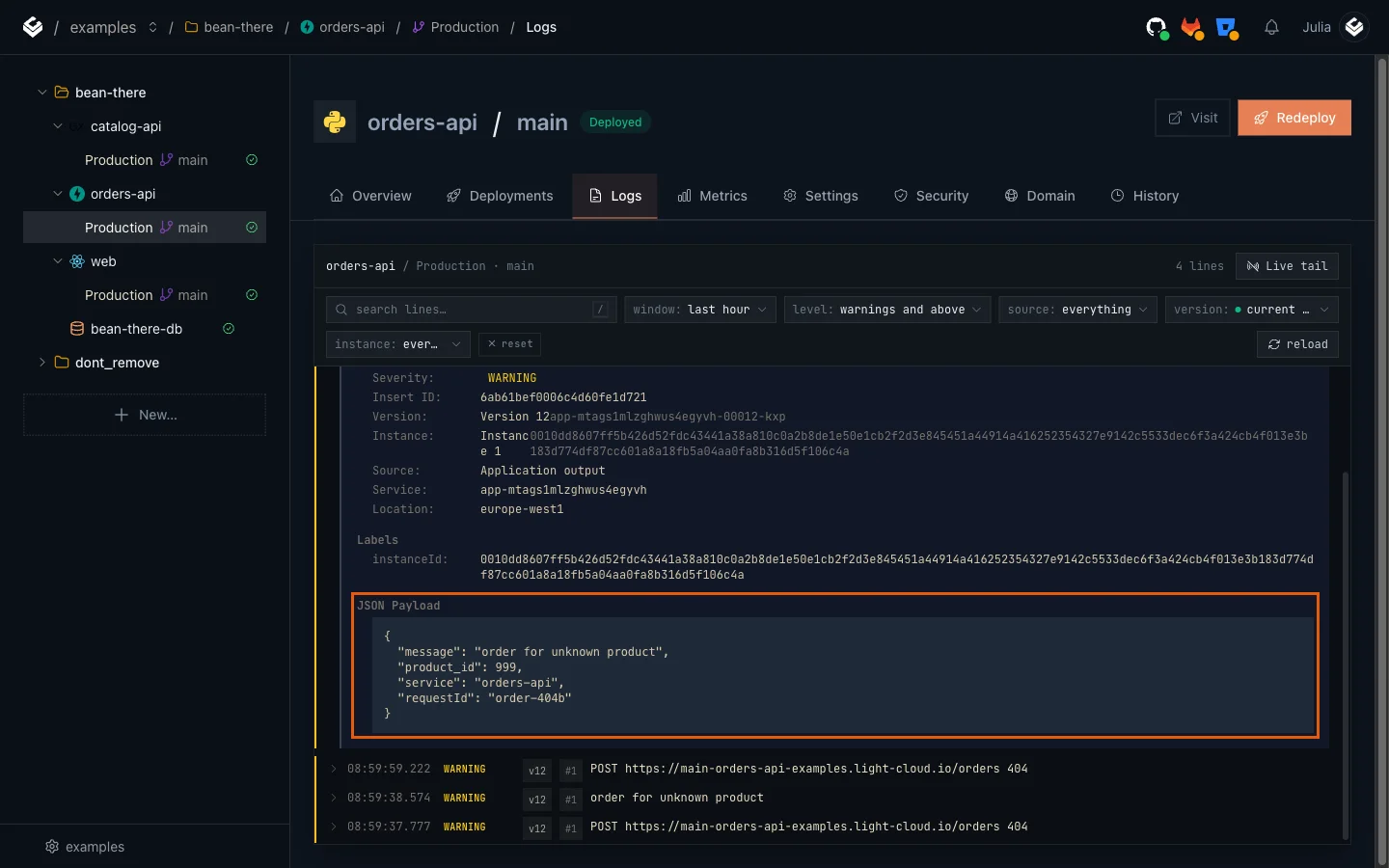 The Logs tab filtered to warnings, with the order for unknown product line expanded and its JSON payload showing product_id 999 and requestId order-404b