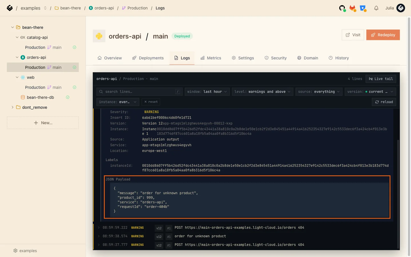 The Logs tab filtered to warnings, with the order for unknown product line expanded and its JSON payload showing product_id 999 and requestId order-404b